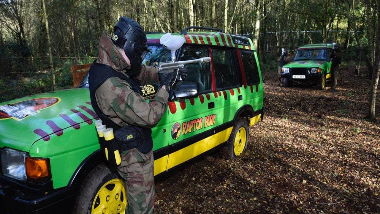 A player taking cover behind a Raptor Park vehicle